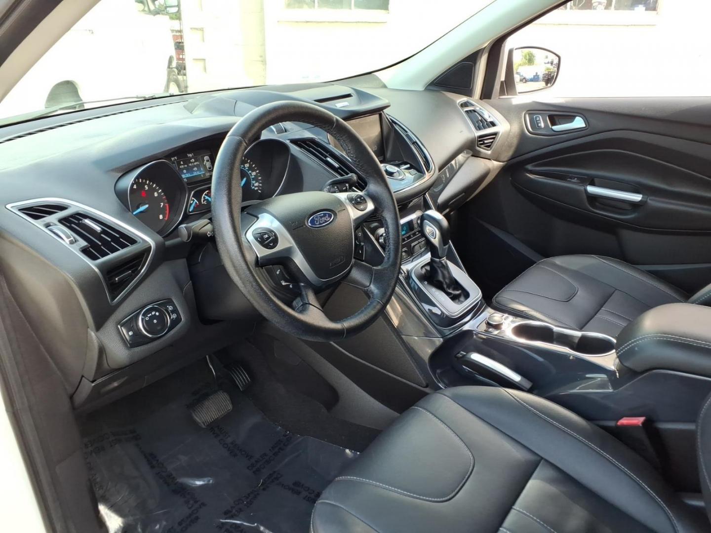 2013 White Platinum Metallic Tri-Coat Ford Escape Titanium (1FMCU0J91DU) with an 2.0L 4 Cylinder Turbocharged engine, AT4X4 transmission, located at 50 Eastern Blvd., Essex, MD, 21221, (410) 686-3444, 39.304367, -76.484947- Photo#7