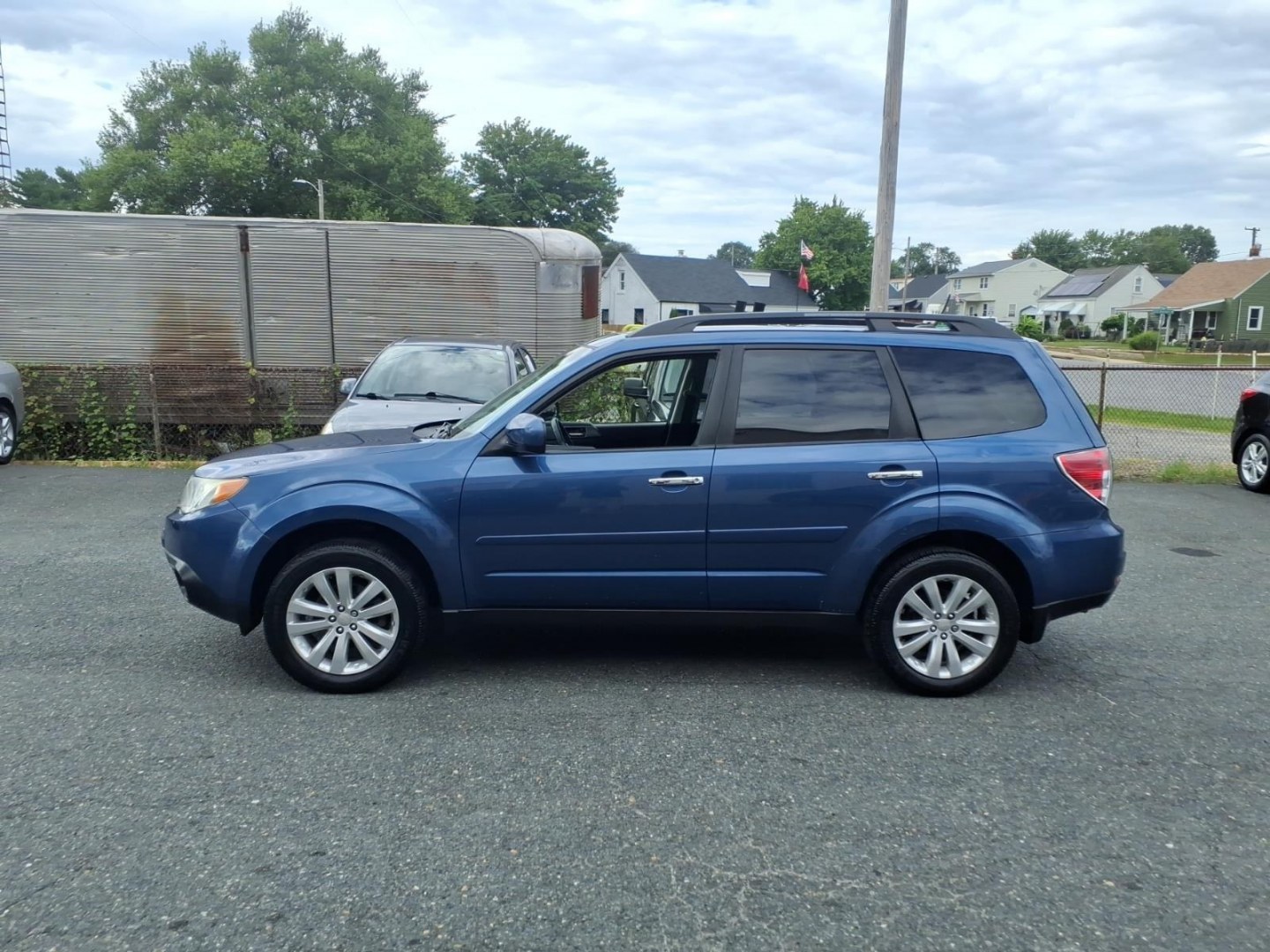 2012 Marine Blue Pearl Subaru Forester 2.5X Limited (JF2SHAEC9CH) with an 2.5L 4 Cylinder Fuel Injected engine, Automatic transmission, located at 50 Eastern Blvd., Essex, MD, 21221, (410) 686-3444, 39.304367, -76.484947- Photo#1