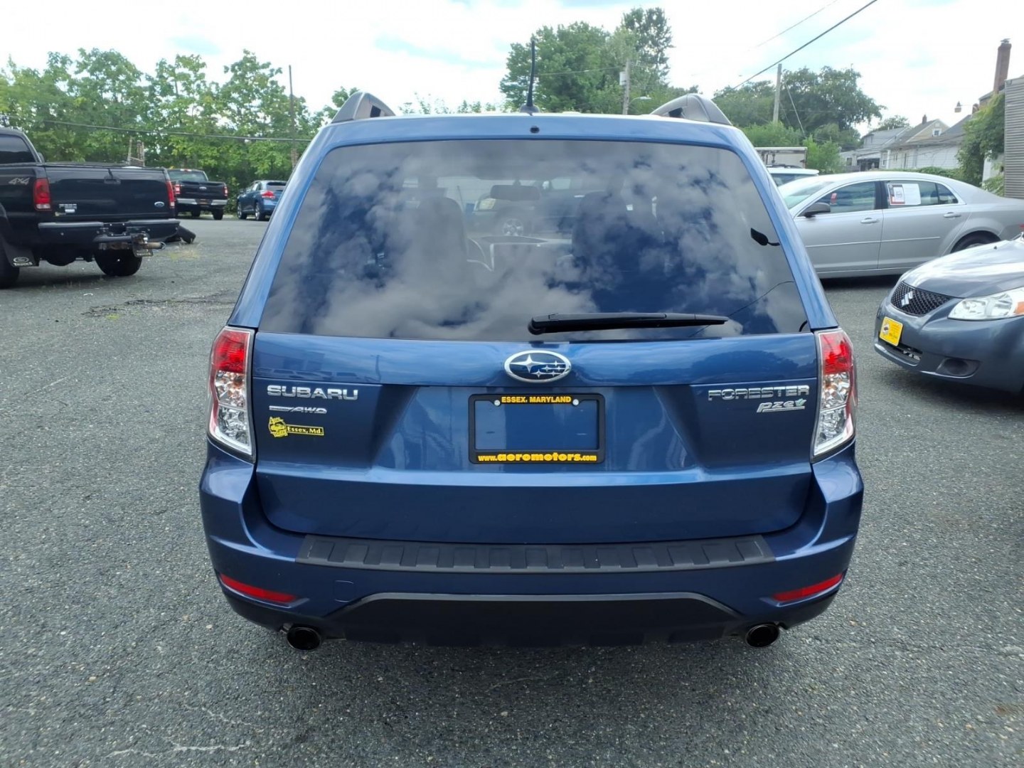 2012 Marine Blue Pearl Subaru Forester 2.5X Limited (JF2SHAEC9CH) with an 2.5L 4 Cylinder Fuel Injected engine, Automatic transmission, located at 50 Eastern Blvd., Essex, MD, 21221, (410) 686-3444, 39.304367, -76.484947- Photo#3