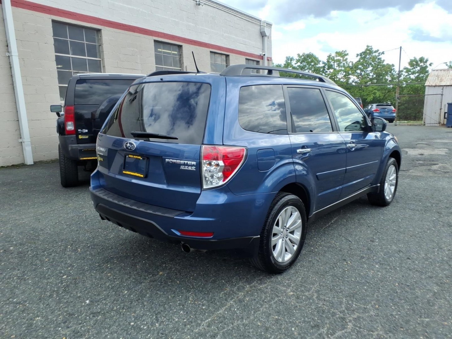2012 Marine Blue Pearl Subaru Forester 2.5X Limited (JF2SHAEC9CH) with an 2.5L 4 Cylinder Fuel Injected engine, Automatic transmission, located at 50 Eastern Blvd., Essex, MD, 21221, (410) 686-3444, 39.304367, -76.484947- Photo#4