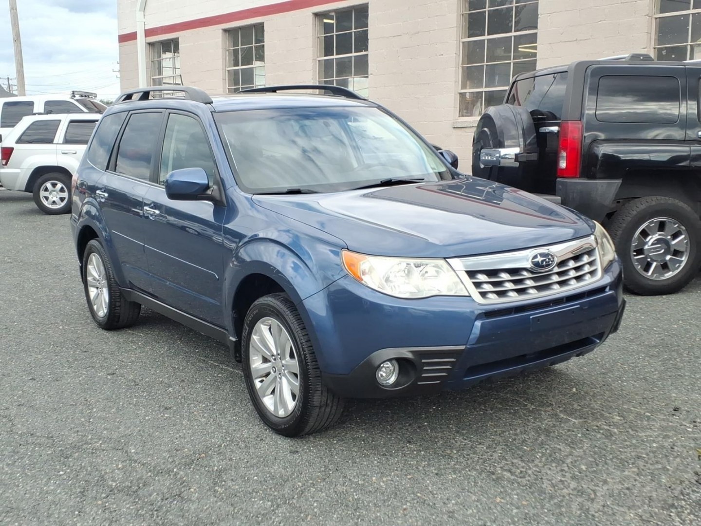 2012 Marine Blue Pearl Subaru Forester 2.5X Limited (JF2SHAEC9CH) with an 2.5L 4 Cylinder Fuel Injected engine, Automatic transmission, located at 50 Eastern Blvd., Essex, MD, 21221, (410) 686-3444, 39.304367, -76.484947- Photo#6