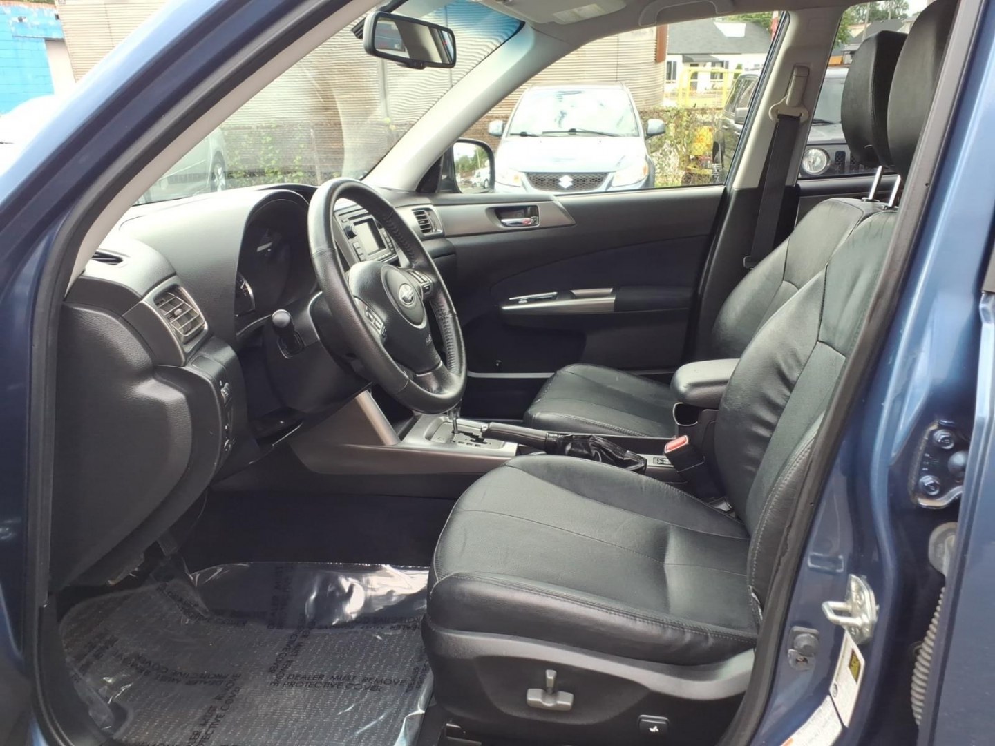 2012 Marine Blue Pearl Subaru Forester 2.5X Limited (JF2SHAEC9CH) with an 2.5L 4 Cylinder Fuel Injected engine, Automatic transmission, located at 50 Eastern Blvd., Essex, MD, 21221, (410) 686-3444, 39.304367, -76.484947- Photo#7