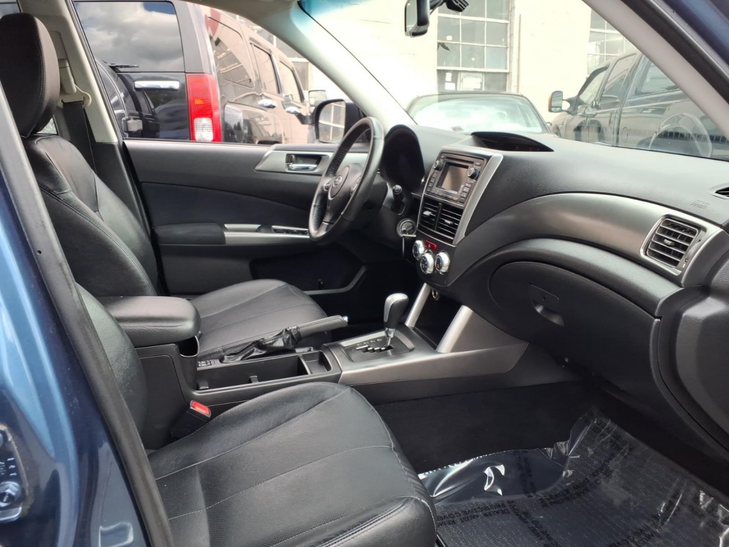 2012 Marine Blue Pearl Subaru Forester 2.5X Limited (JF2SHAEC9CH) with an 2.5L 4 Cylinder Fuel Injected engine, Automatic transmission, located at 50 Eastern Blvd., Essex, MD, 21221, (410) 686-3444, 39.304367, -76.484947- Photo#14