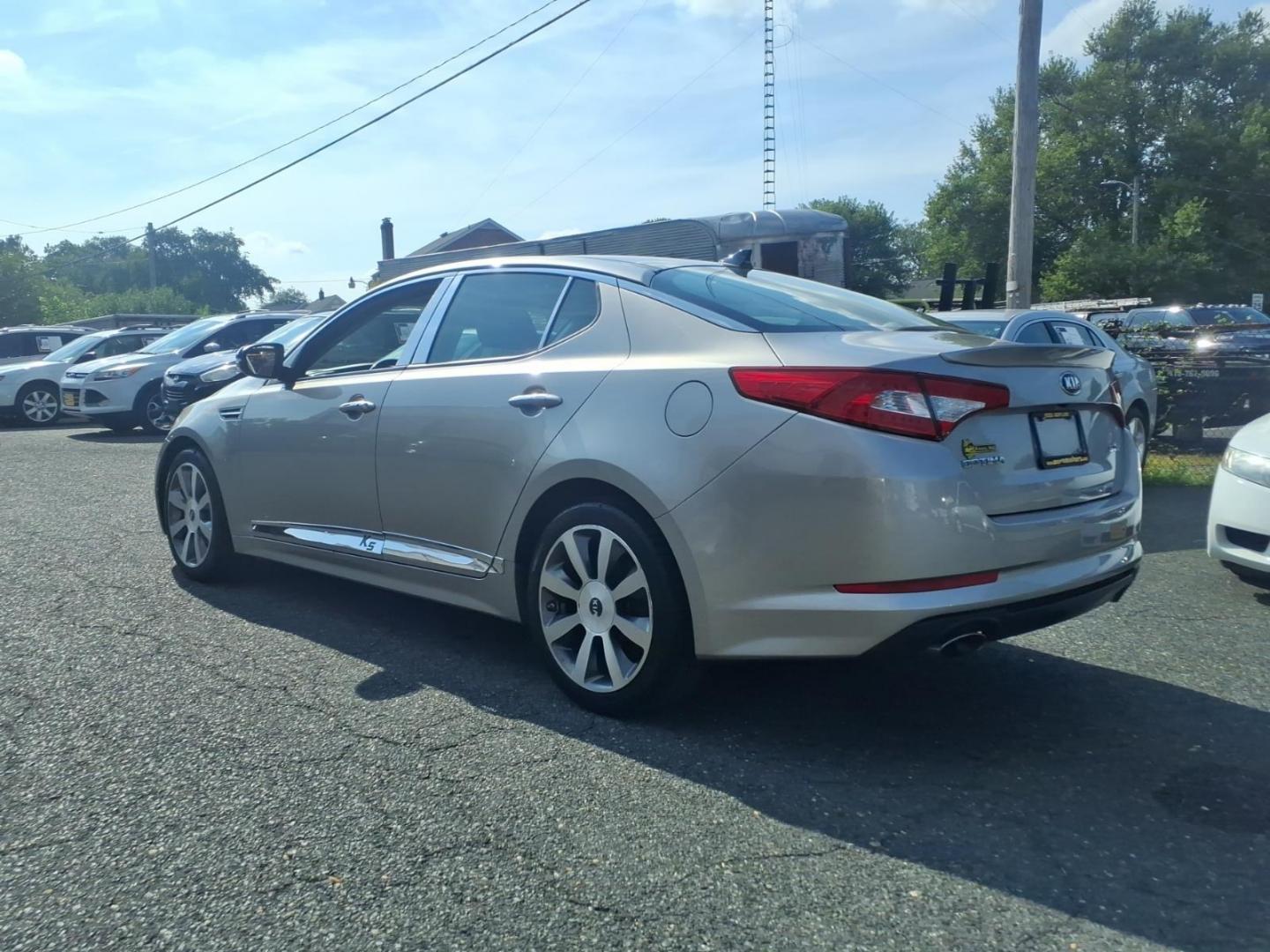 2013 Bright Silver Kia Optima SX (5XXGR4A62DG) with an 2.0L 2.0L Turbo I4 274hp 269ft. lbs. Turbocharged engine, 6-Speed Automatic Sportmatic transmission, located at 50 Eastern Blvd., Essex, MD, 21221, (410) 686-3444, 39.304367, -76.484947- Photo#2