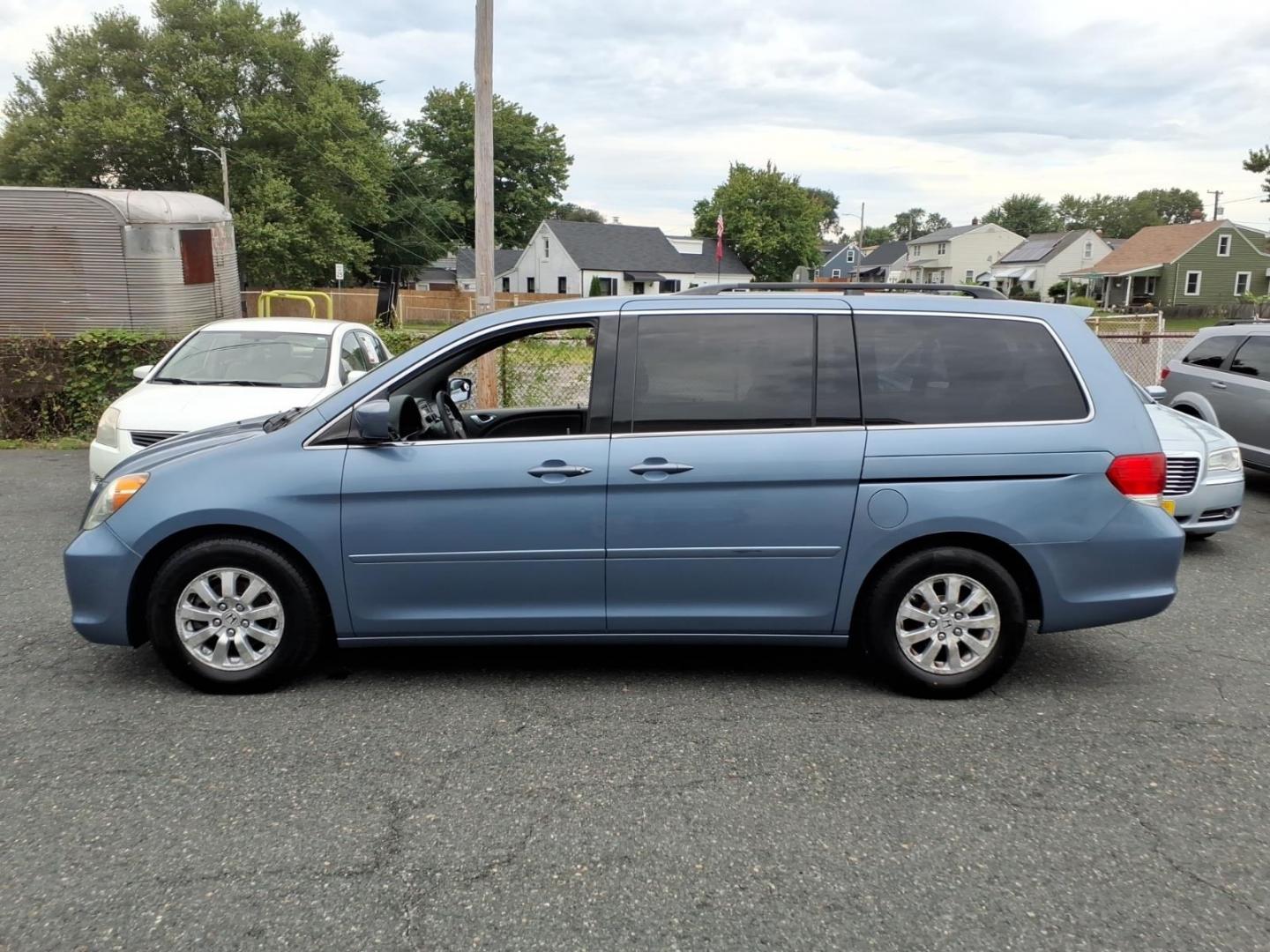 2010 Blue Honda Odyssey EX (5FNRL3H47AB) with an 3.5L 6 Cylinder Sequential-Port F.I. engine, V6 transmission, located at 50 Eastern Blvd., Essex, MD, 21221, (410) 686-3444, 39.304367, -76.484947- Photo#1