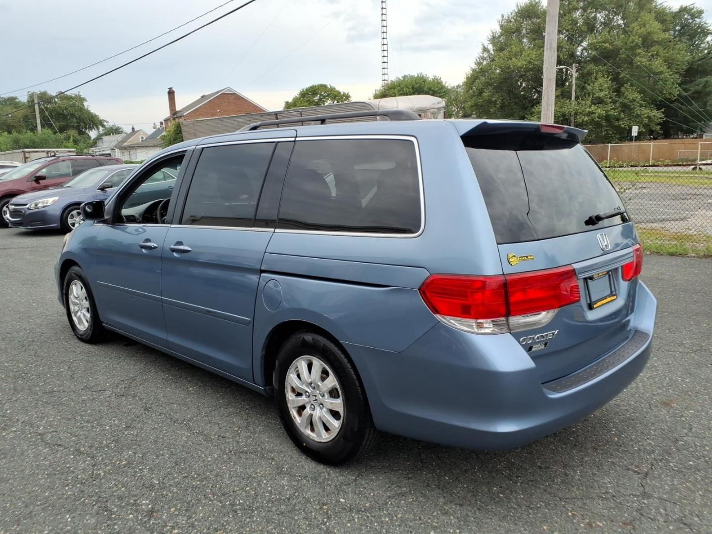 2010 Blue Honda Odyssey EX (5FNRL3H47AB) with an 3.5L 6 Cylinder Sequential-Port F.I. engine, V6 transmission, located at 50 Eastern Blvd., Essex, MD, 21221, (410) 686-3444, 39.304367, -76.484947- Photo#2