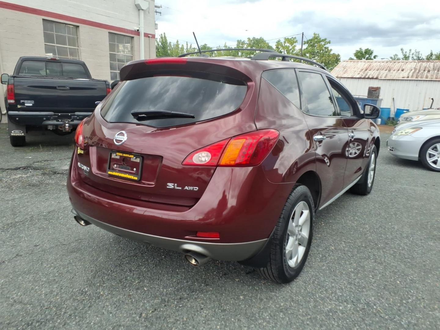 2010 Dk. Red Nissan Murano SL (JN8AZ1MW6AW) with an 3.5L 3.5L V6 265hp 248ft. lbs. Fuel Injected engine, CVT transmission, located at 50 Eastern Blvd., Essex, MD, 21221, (410) 686-3444, 39.304367, -76.484947- Photo#4