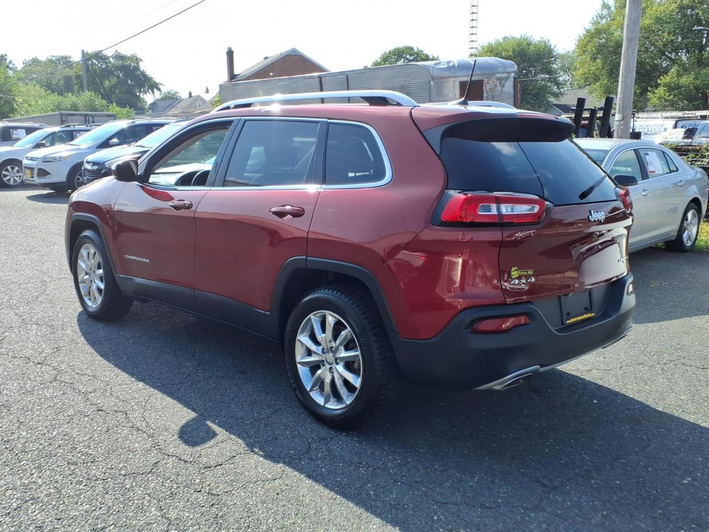 2016 Red Jeep Cherokee Limited (1C4PJMDS5GW) with an 3.2L 6 Cylinder Sequential-Port F.I. engine, ATAWD transmission, located at 50 Eastern Blvd., Essex, MD, 21221, (410) 686-3444, 39.304367, -76.484947- Photo#2