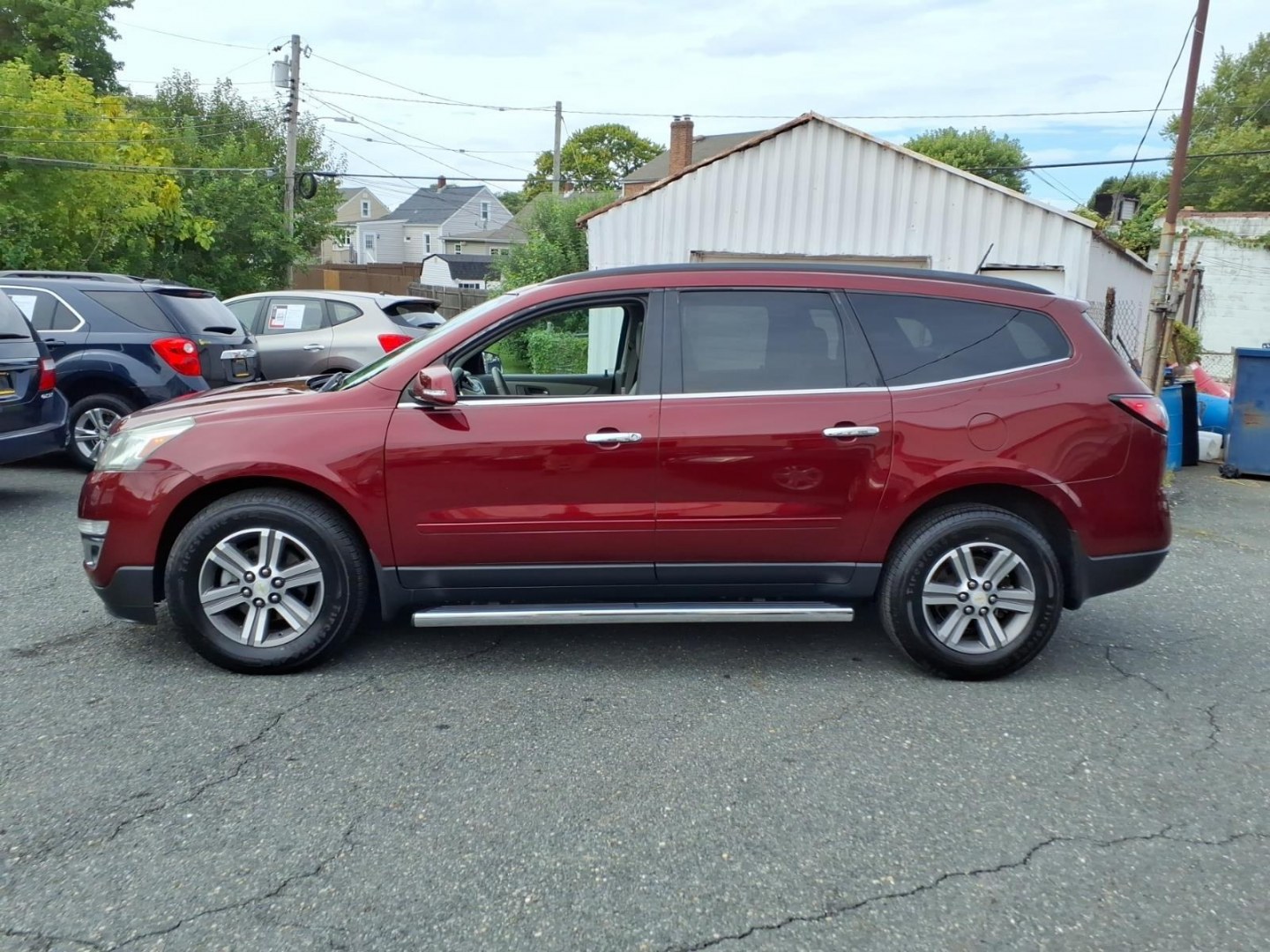 2017 Red Chevrolet Traverse LT (1GNKVHKD4HJ) with an 3.6L 6 Cylinder Fuel Injected engine, V6 transmission, located at 50 Eastern Blvd., Essex, MD, 21221, (410) 686-3444, 39.304367, -76.484947- Photo#1