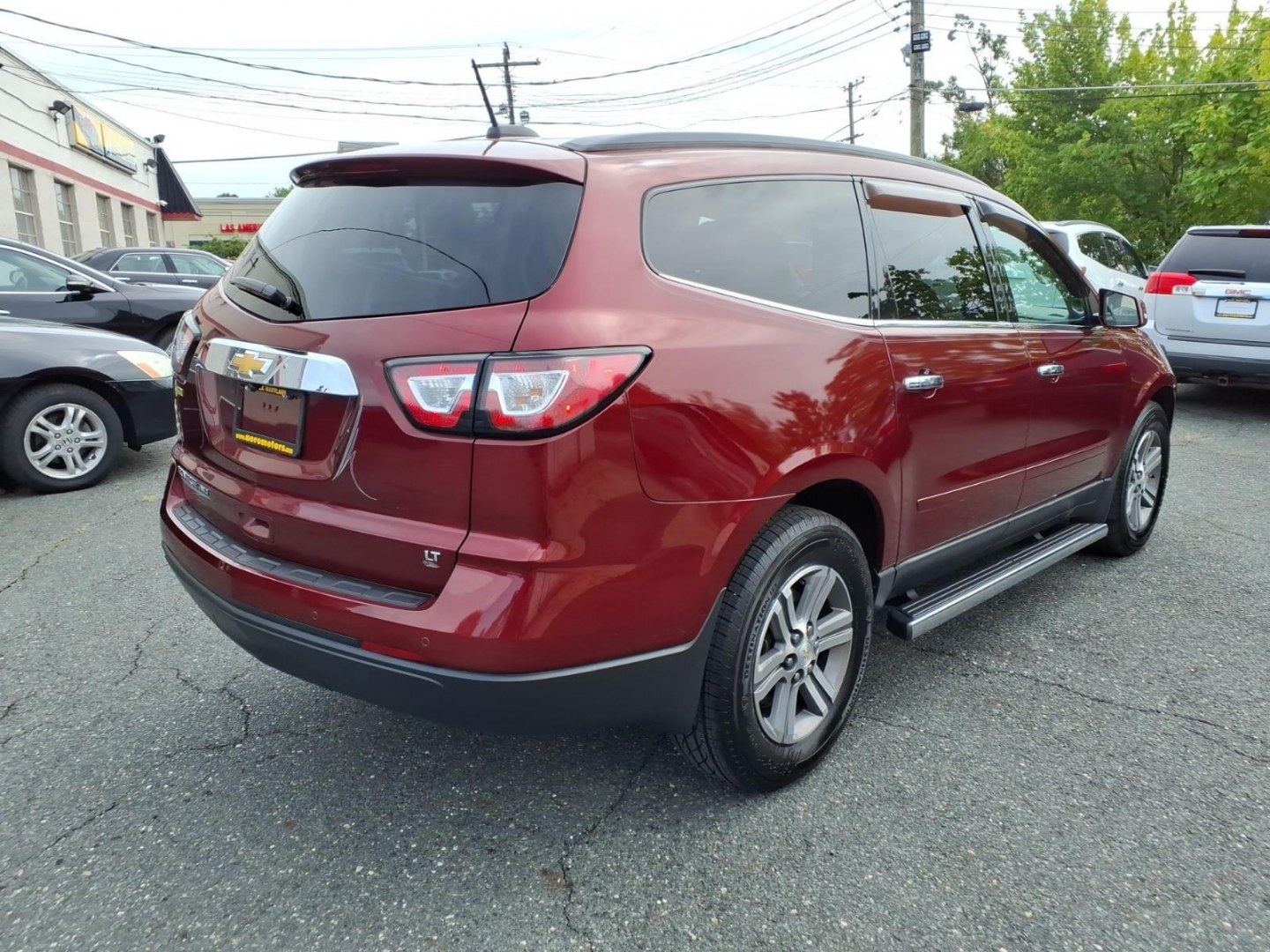 2017 Red Chevrolet Traverse LT (1GNKVHKD4HJ) with an 3.6L 6 Cylinder Fuel Injected engine, V6 transmission, located at 50 Eastern Blvd., Essex, MD, 21221, (410) 686-3444, 39.304367, -76.484947- Photo#4
