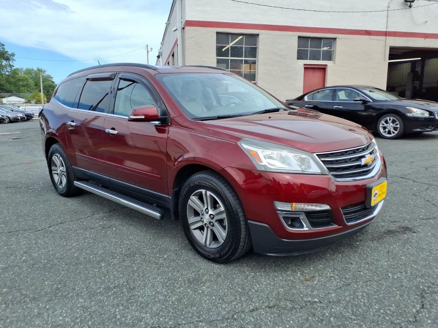 2017 Red Chevrolet Traverse LT (1GNKVHKD4HJ) with an 3.6L 6 Cylinder Fuel Injected engine, V6 transmission, located at 50 Eastern Blvd., Essex, MD, 21221, (410) 686-3444, 39.304367, -76.484947- Photo#6