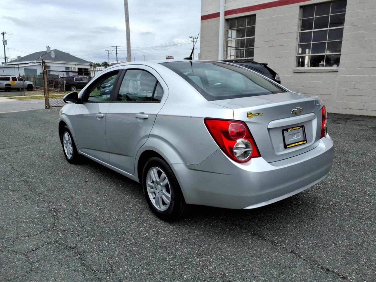 2012 Silver Chevrolet Sonic LS (1G1JA5SH3C4) with an 1.8L 4 Cylinder Sequential-Port F.I. engine, Automatic transmission, located at 50 Eastern Blvd., Essex, MD, 21221, (410) 686-3444, 39.304367, -76.484947- Photo#2