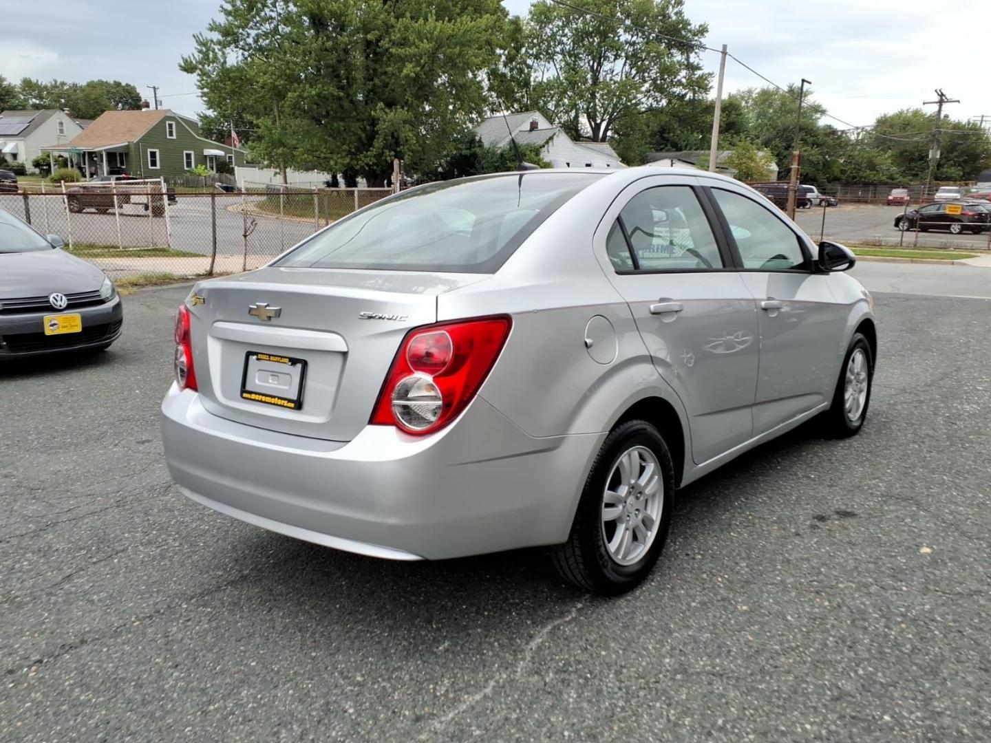 2012 Silver Chevrolet Sonic LS (1G1JA5SH3C4) with an 1.8L 4 Cylinder Sequential-Port F.I. engine, Automatic transmission, located at 50 Eastern Blvd., Essex, MD, 21221, (410) 686-3444, 39.304367, -76.484947- Photo#4