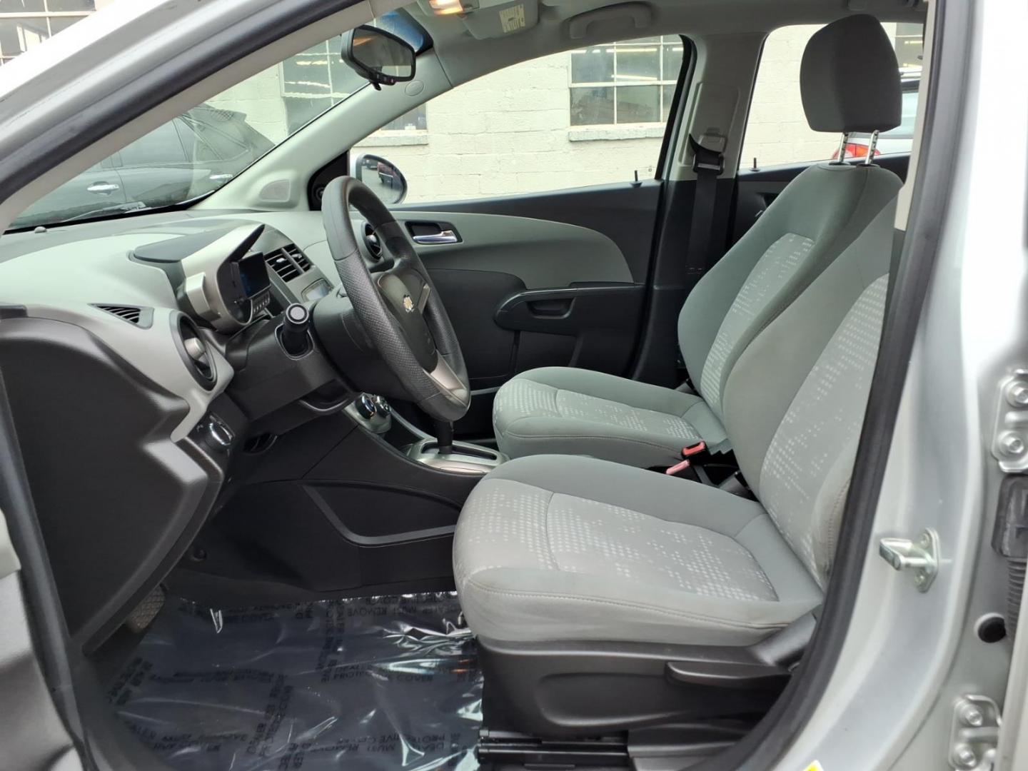 2012 Silver Chevrolet Sonic LS (1G1JA5SH3C4) with an 1.8L 4 Cylinder Sequential-Port F.I. engine, Automatic transmission, located at 50 Eastern Blvd., Essex, MD, 21221, (410) 686-3444, 39.304367, -76.484947- Photo#7