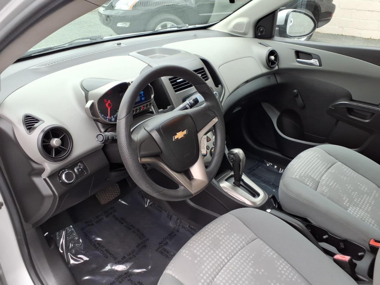 2012 Silver Chevrolet Sonic LS (1G1JA5SH3C4) with an 1.8L 4 Cylinder Sequential-Port F.I. engine, Automatic transmission, located at 50 Eastern Blvd., Essex, MD, 21221, (410) 686-3444, 39.304367, -76.484947- Photo#8
