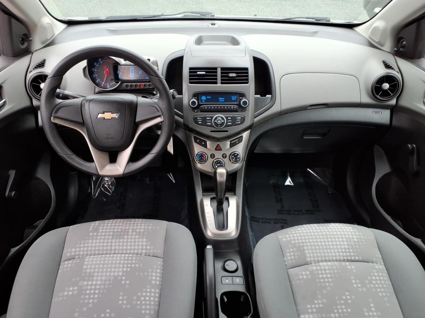 2012 Silver Chevrolet Sonic LS (1G1JA5SH3C4) with an 1.8L 4 Cylinder Sequential-Port F.I. engine, Automatic transmission, located at 50 Eastern Blvd., Essex, MD, 21221, (410) 686-3444, 39.304367, -76.484947- Photo#16