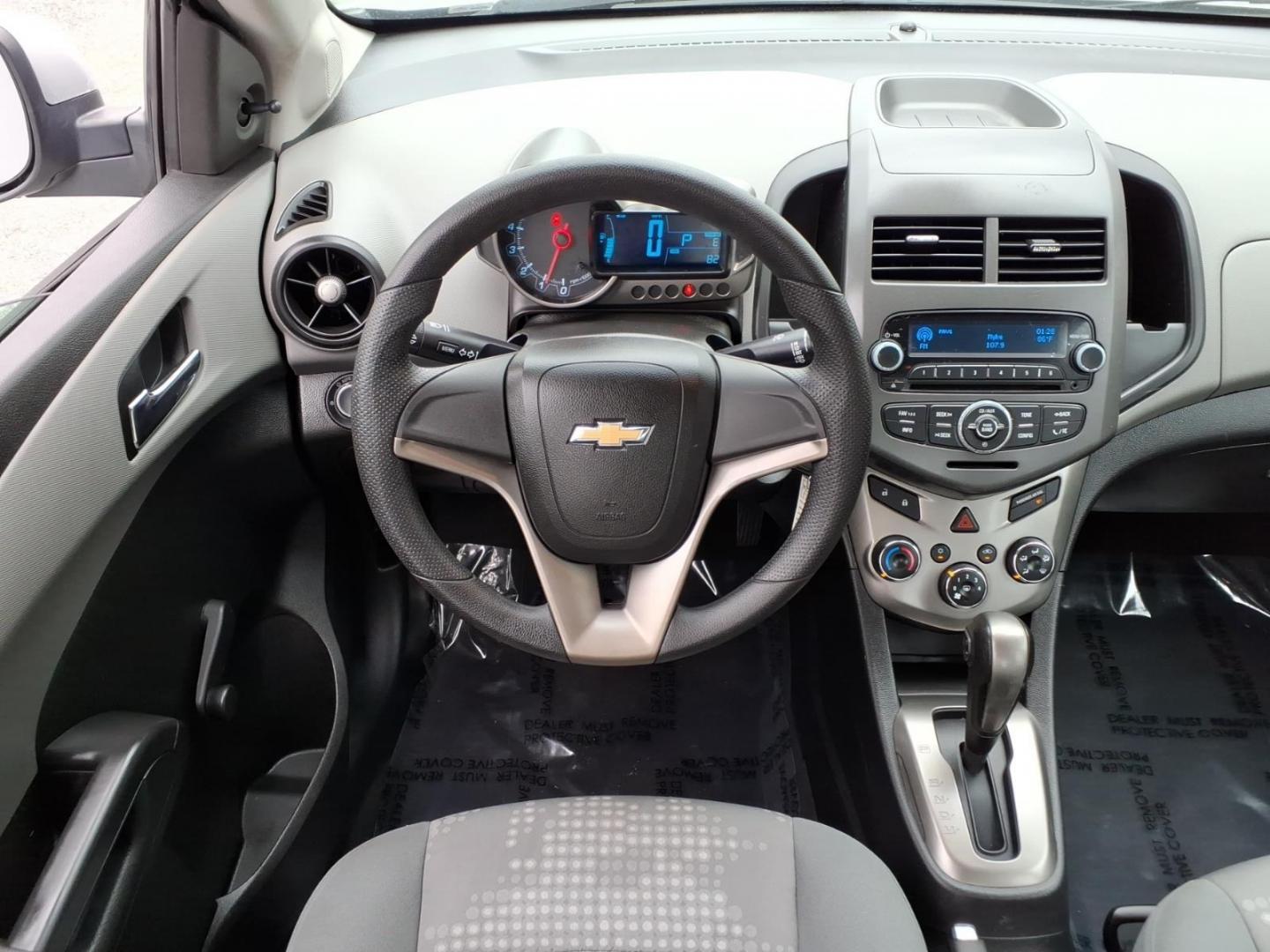 2012 Silver Chevrolet Sonic LS (1G1JA5SH3C4) with an 1.8L 4 Cylinder Sequential-Port F.I. engine, Automatic transmission, located at 50 Eastern Blvd., Essex, MD, 21221, (410) 686-3444, 39.304367, -76.484947- Photo#17