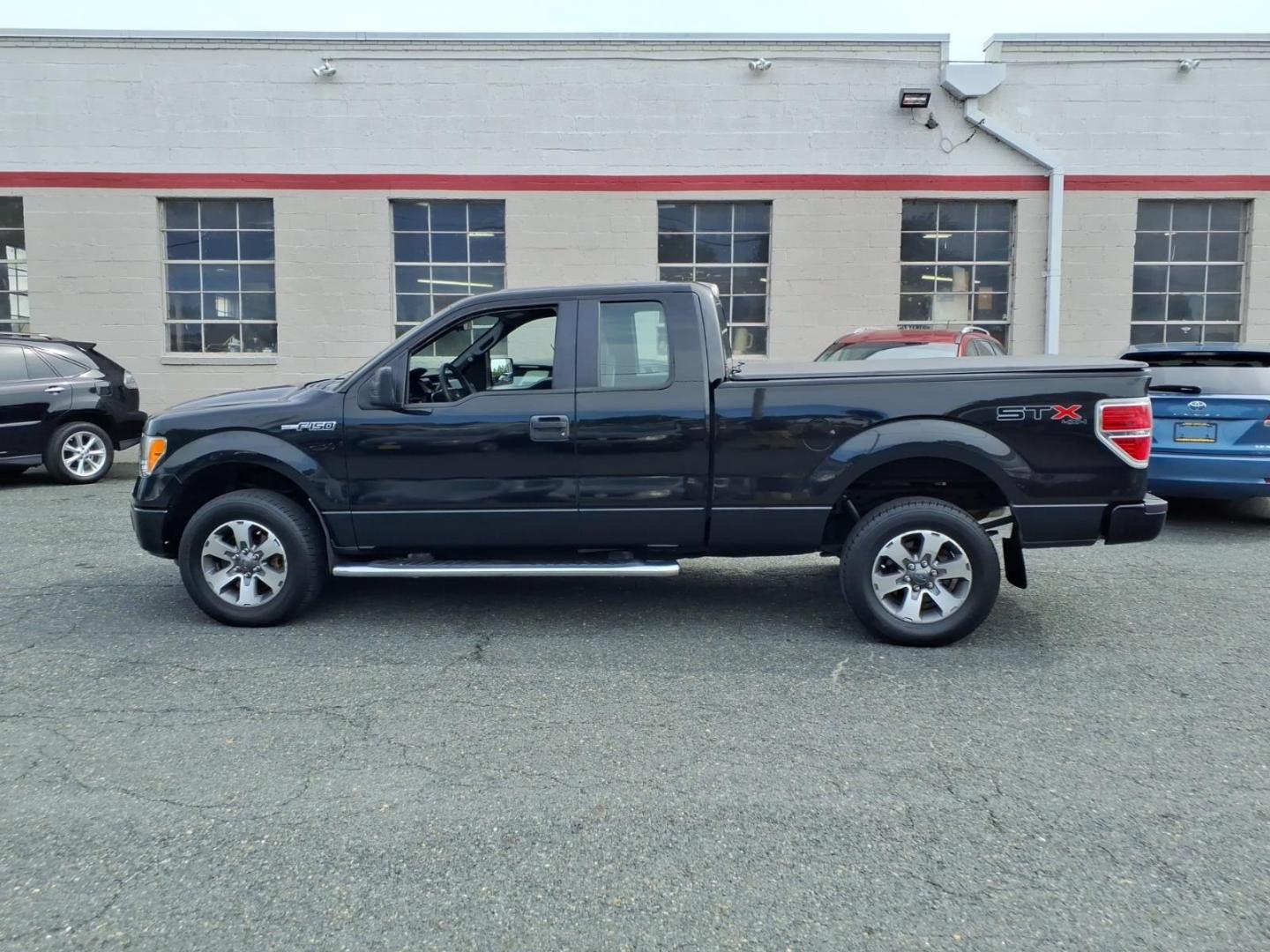 2013 Black Ford F-150 STX (1FTFX1EF6DF) with an 5.0L 8 Cylinder Sequential-Port F.I. engine, AT4X4 transmission, located at 50 Eastern Blvd., Essex, MD, 21221, (410) 686-3444, 39.304367, -76.484947- Photo#1