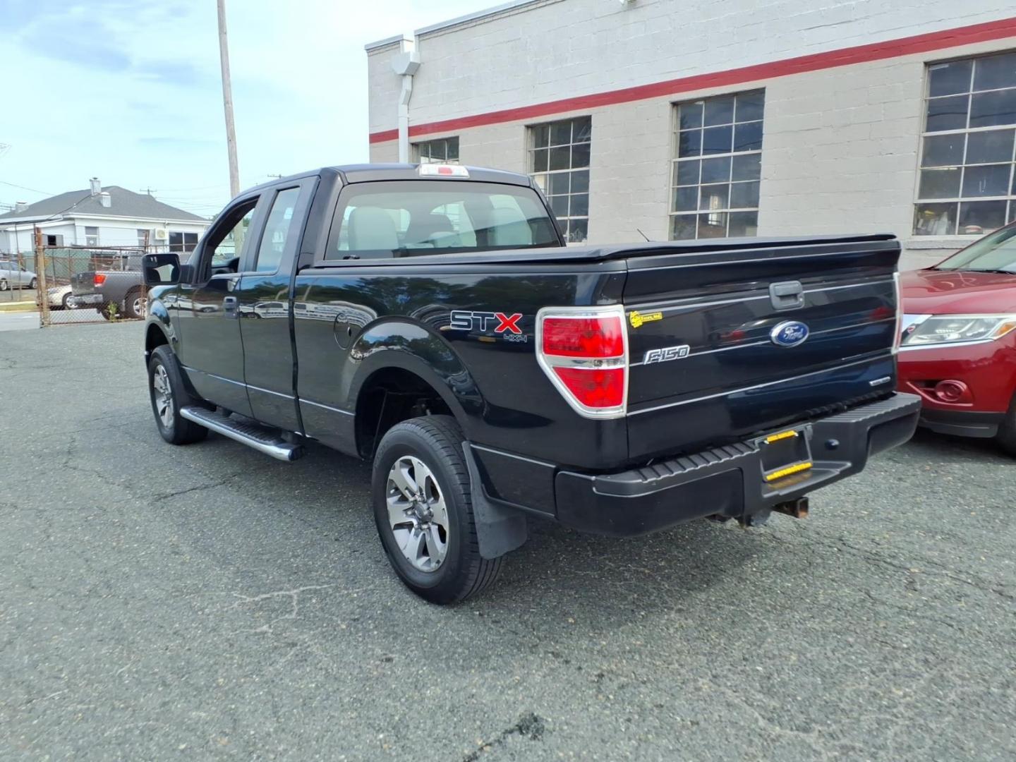 2013 Black Ford F-150 STX (1FTFX1EF6DF) with an 5.0L 8 Cylinder Sequential-Port F.I. engine, AT4X4 transmission, located at 50 Eastern Blvd., Essex, MD, 21221, (410) 686-3444, 39.304367, -76.484947- Photo#2