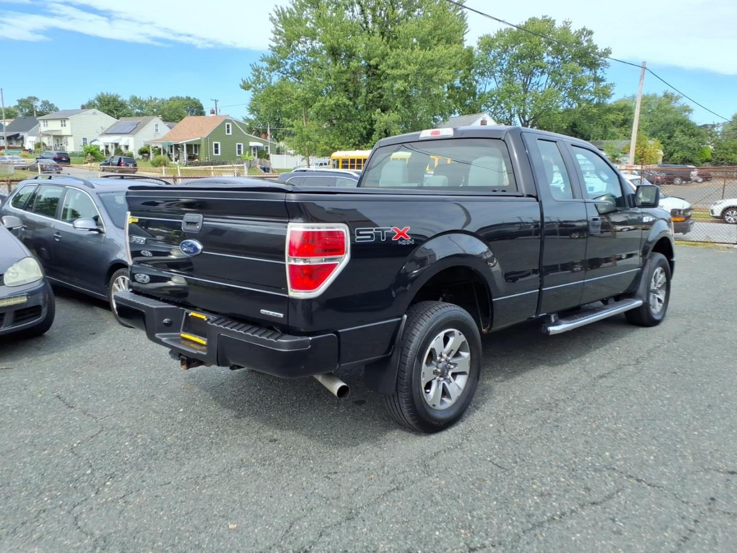 2013 Black Ford F-150 STX (1FTFX1EF6DF) with an 5.0L 8 Cylinder Sequential-Port F.I. engine, AT4X4 transmission, located at 50 Eastern Blvd., Essex, MD, 21221, (410) 686-3444, 39.304367, -76.484947- Photo#4