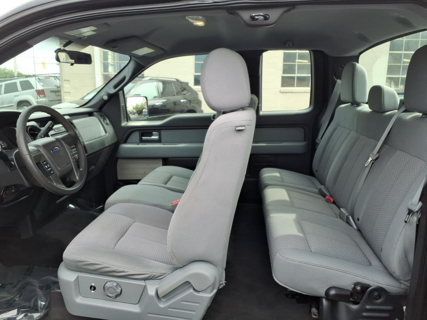 2013 Black Ford F-150 STX (1FTFX1EF6DF) with an 5.0L 8 Cylinder Sequential-Port F.I. engine, AT4X4 transmission, located at 50 Eastern Blvd., Essex, MD, 21221, (410) 686-3444, 39.304367, -76.484947- Photo#11