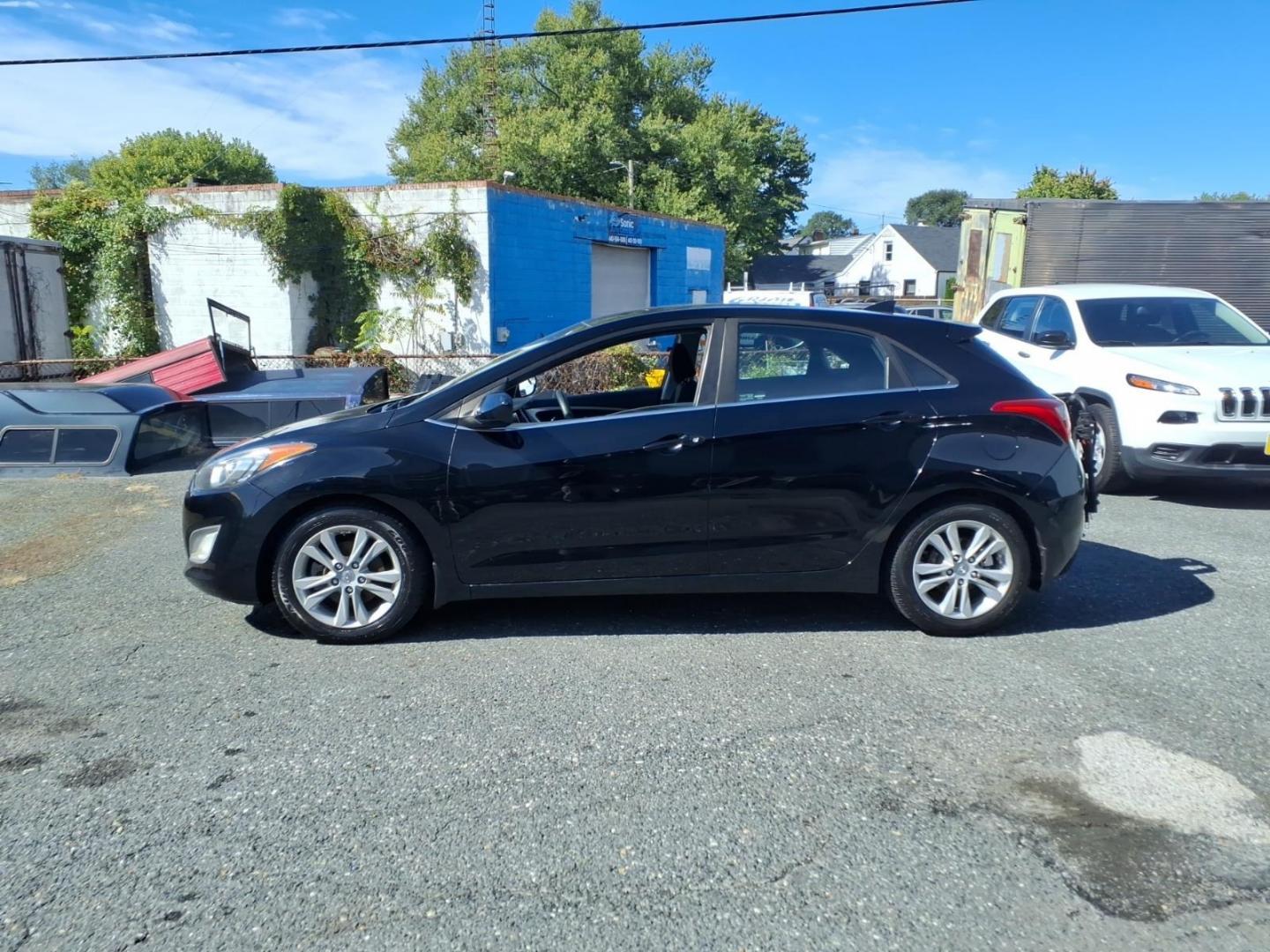 2013 Black Hyundai ELANTRA GT Base (KMHD35LE9DU) with an 1.8L 4 Cylinder Sequential Fuel Injection engine, Automatic transmission, located at 50 Eastern Blvd., Essex, MD, 21221, (410) 686-3444, 39.304367, -76.484947- Photo#1