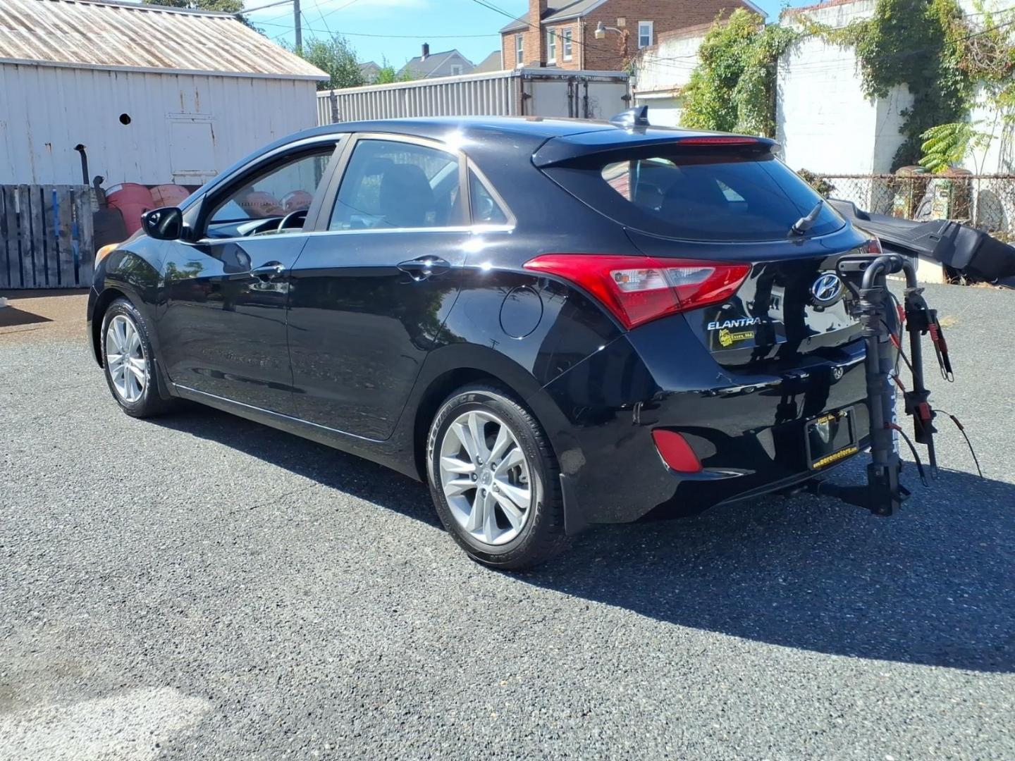 2013 Black Hyundai ELANTRA GT Base (KMHD35LE9DU) with an 1.8L 4 Cylinder Sequential Fuel Injection engine, Automatic transmission, located at 50 Eastern Blvd., Essex, MD, 21221, (410) 686-3444, 39.304367, -76.484947- Photo#2