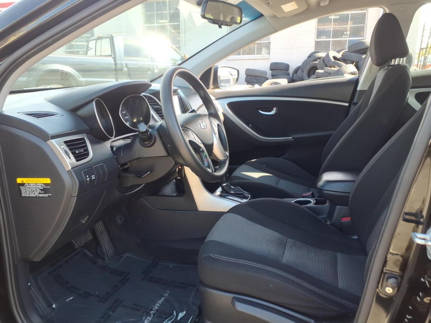 2013 Black Hyundai ELANTRA GT Base (KMHD35LE9DU) with an 1.8L 4 Cylinder Sequential Fuel Injection engine, Automatic transmission, located at 50 Eastern Blvd., Essex, MD, 21221, (410) 686-3444, 39.304367, -76.484947- Photo#7