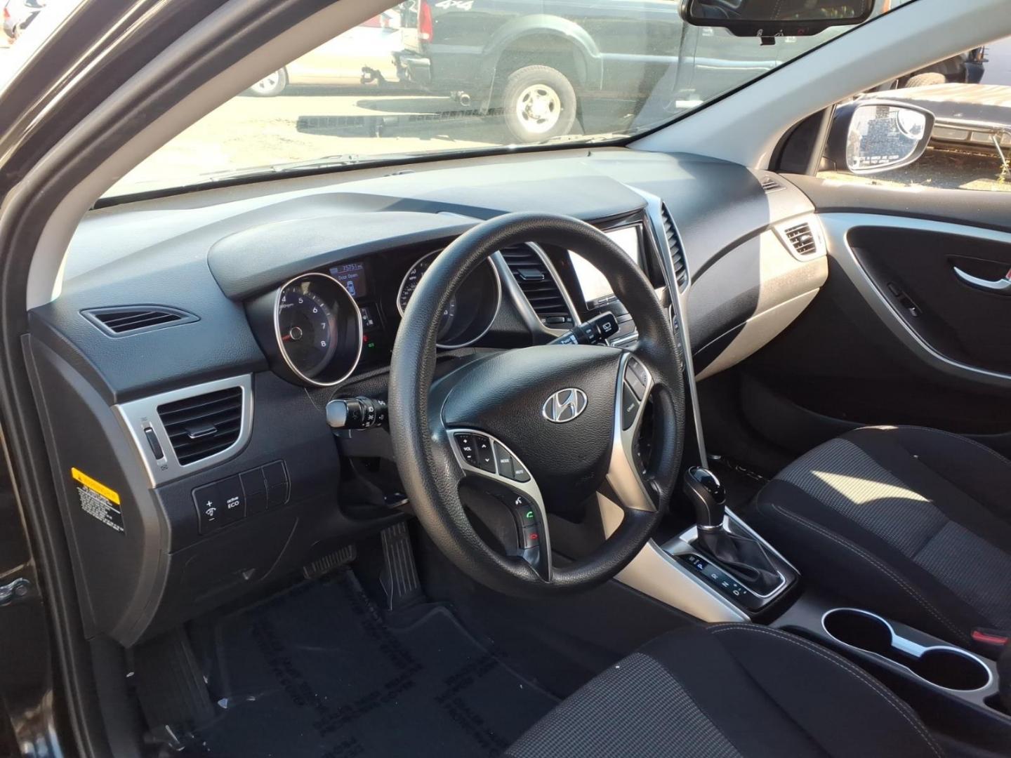 2013 Black Hyundai ELANTRA GT Base (KMHD35LE9DU) with an 1.8L 4 Cylinder Sequential Fuel Injection engine, Automatic transmission, located at 50 Eastern Blvd., Essex, MD, 21221, (410) 686-3444, 39.304367, -76.484947- Photo#8