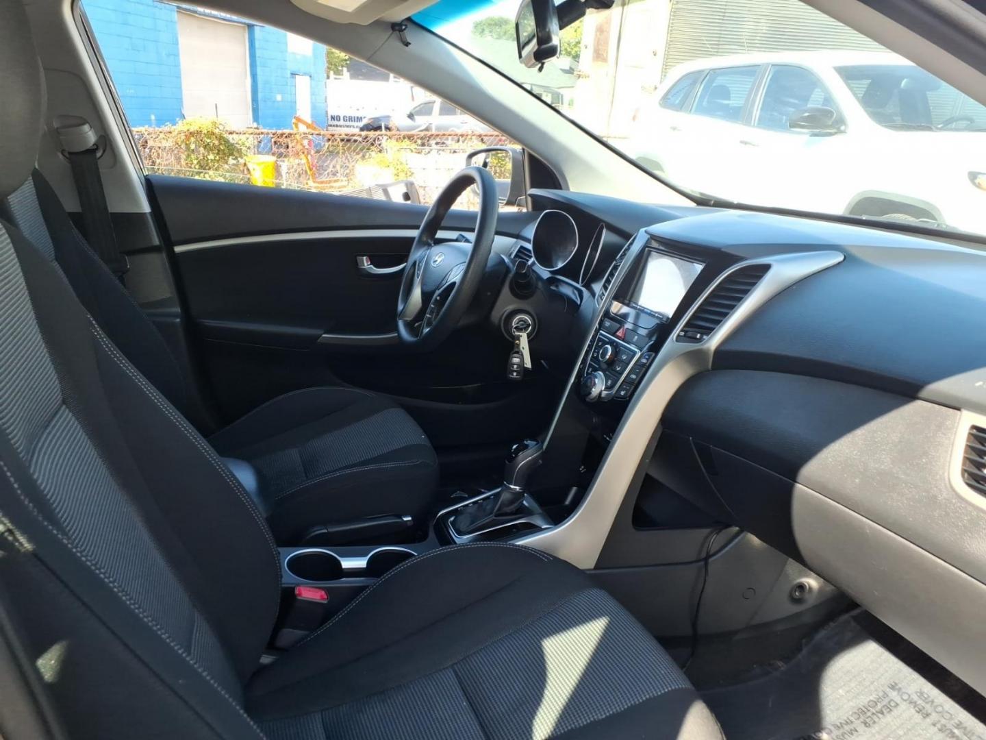 2013 Black Hyundai ELANTRA GT Base (KMHD35LE9DU) with an 1.8L 4 Cylinder Sequential Fuel Injection engine, Automatic transmission, located at 50 Eastern Blvd., Essex, MD, 21221, (410) 686-3444, 39.304367, -76.484947- Photo#12