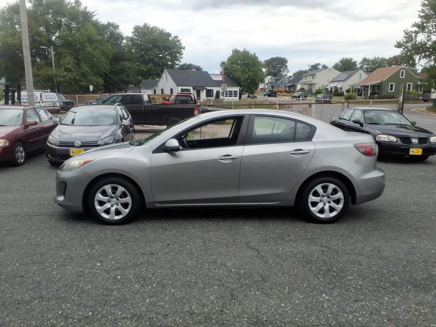 2013 Liquid Silver Metallic Mazda Mazda3 i SV (JM1BL1TF1D1) with an 2.0L 4 Cylinder Fuel Injected engine, Automatic transmission, located at 50 Eastern Blvd., Essex, MD, 21221, (410) 686-3444, 39.304367, -76.484947- Photo#1