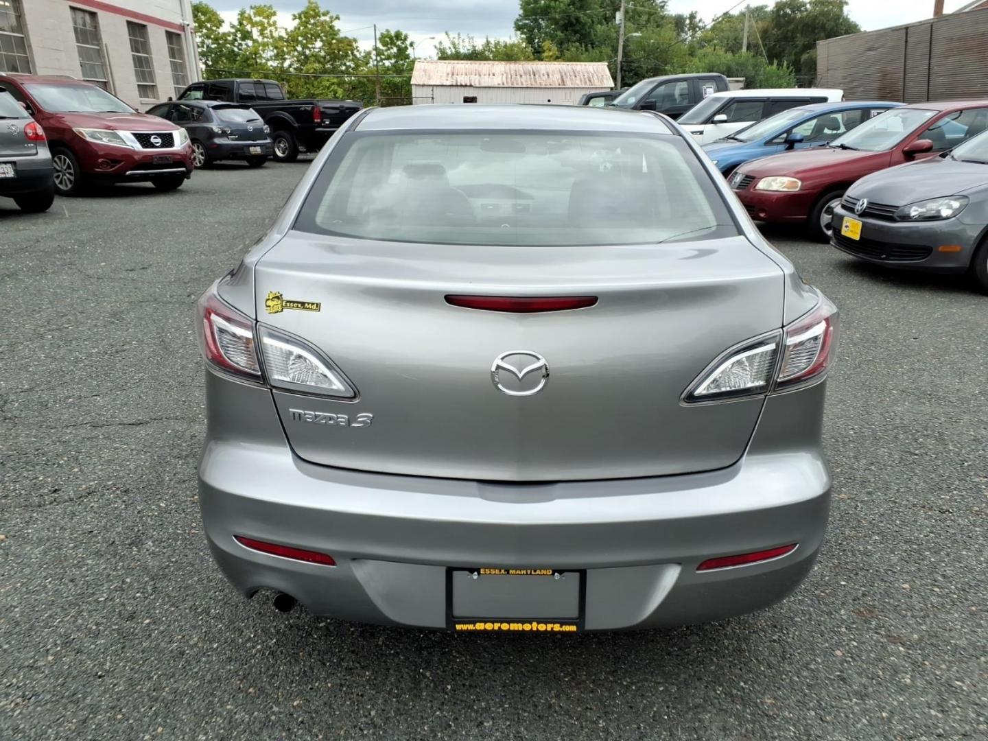 2013 Liquid Silver Metallic Mazda Mazda3 i SV (JM1BL1TF1D1) with an 2.0L 4 Cylinder Fuel Injected engine, Automatic transmission, located at 50 Eastern Blvd., Essex, MD, 21221, (410) 686-3444, 39.304367, -76.484947- Photo#3