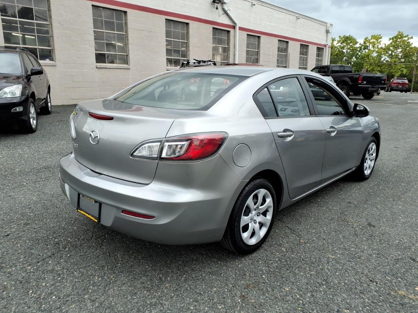 2013 Liquid Silver Metallic Mazda Mazda3 i SV (JM1BL1TF1D1) with an 2.0L 4 Cylinder Fuel Injected engine, Automatic transmission, located at 50 Eastern Blvd., Essex, MD, 21221, (410) 686-3444, 39.304367, -76.484947- Photo#4
