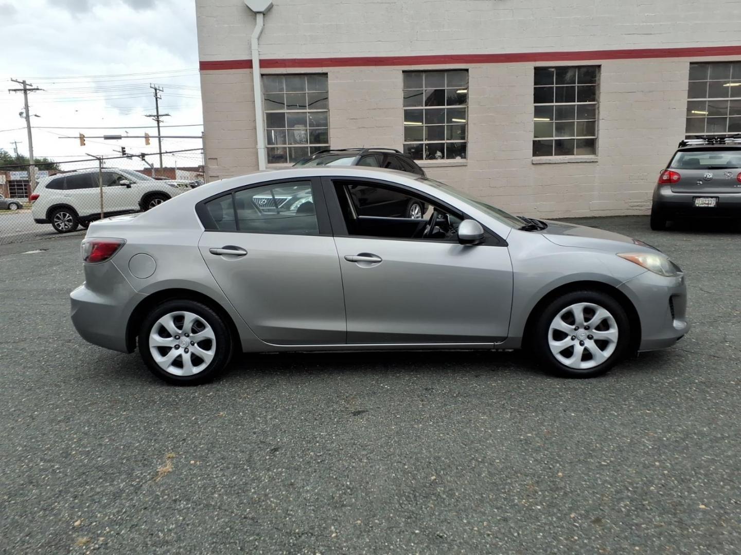 2013 Liquid Silver Metallic Mazda Mazda3 i SV (JM1BL1TF1D1) with an 2.0L 4 Cylinder Fuel Injected engine, Automatic transmission, located at 50 Eastern Blvd., Essex, MD, 21221, (410) 686-3444, 39.304367, -76.484947- Photo#5