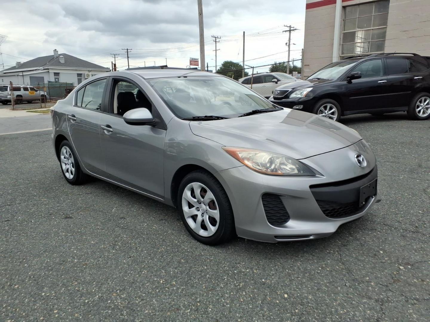 2013 Liquid Silver Metallic Mazda Mazda3 i SV (JM1BL1TF1D1) with an 2.0L 4 Cylinder Fuel Injected engine, Automatic transmission, located at 50 Eastern Blvd., Essex, MD, 21221, (410) 686-3444, 39.304367, -76.484947- Photo#6