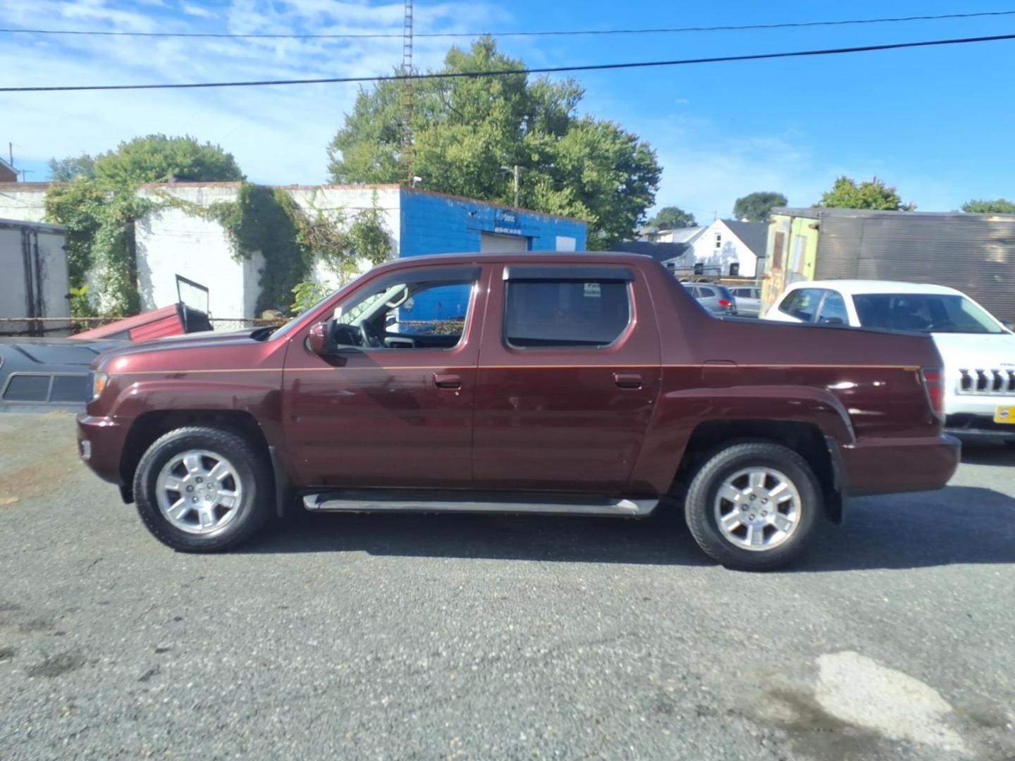 2013 Burgundy Honda Ridgeline RTS (5FPYK1F42DB) with an 3.5L 6 Cylinder Sequential-Port F.I. engine, ATV6 transmission, located at 50 Eastern Blvd., Essex, MD, 21221, (410) 686-3444, 39.304367, -76.484947- Photo#1