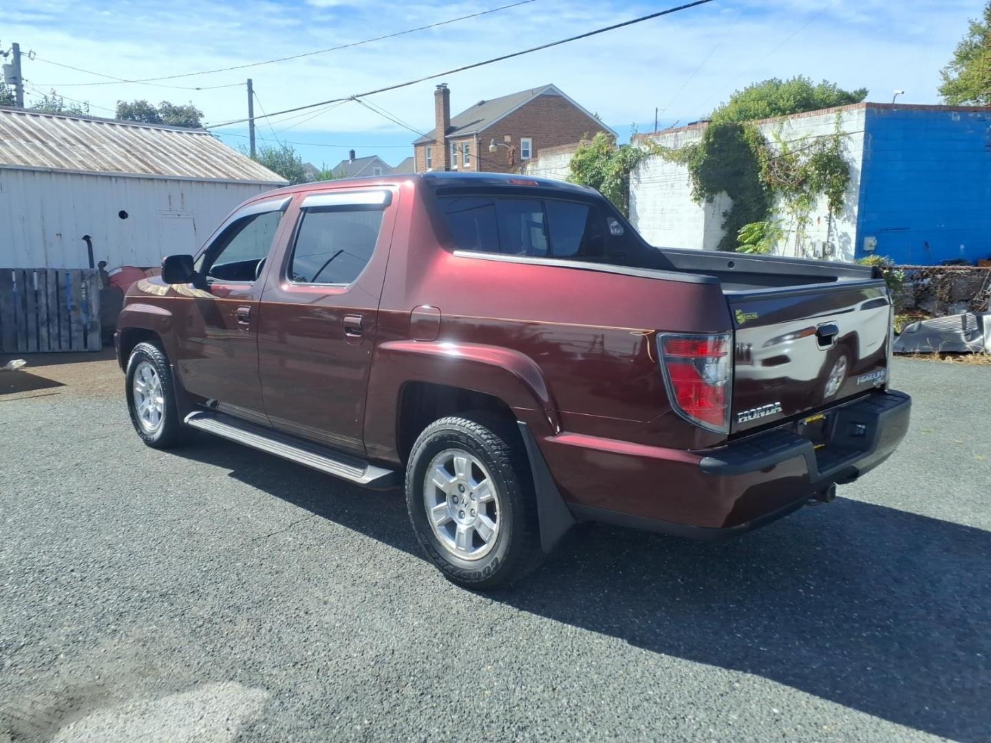 2013 Burgundy Honda Ridgeline RTS (5FPYK1F42DB) with an 3.5L 6 Cylinder Sequential-Port F.I. engine, ATV6 transmission, located at 50 Eastern Blvd., Essex, MD, 21221, (410) 686-3444, 39.304367, -76.484947- Photo#2