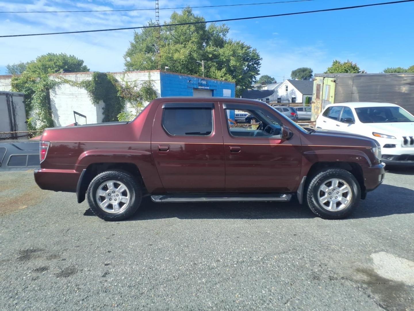 2013 Burgundy Honda Ridgeline RTS (5FPYK1F42DB) with an 3.5L 6 Cylinder Sequential-Port F.I. engine, ATV6 transmission, located at 50 Eastern Blvd., Essex, MD, 21221, (410) 686-3444, 39.304367, -76.484947- Photo#5
