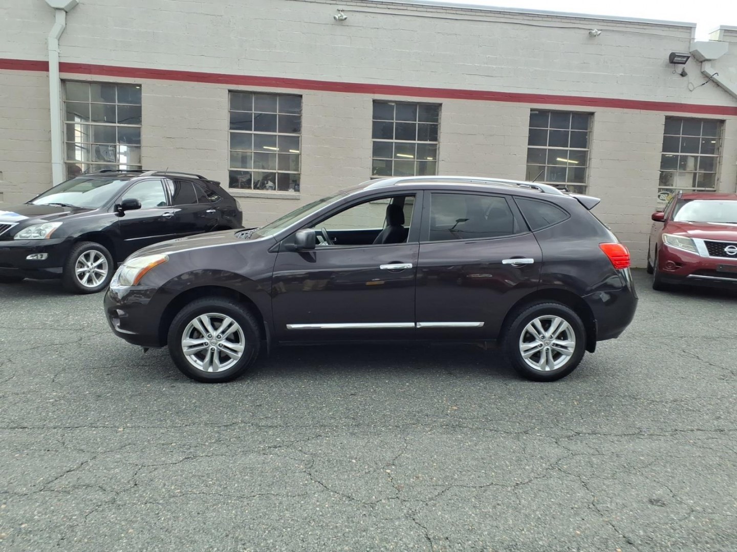 2015 Black Amethyst Nissan Rogue Select S (JN8AS5MV6FW) with an 2.5L 4 Cylinder Sequential-Port F.I. engine, Automatic transmission, located at 50 Eastern Blvd., Essex, MD, 21221, (410) 686-3444, 39.304367, -76.484947- Photo#1