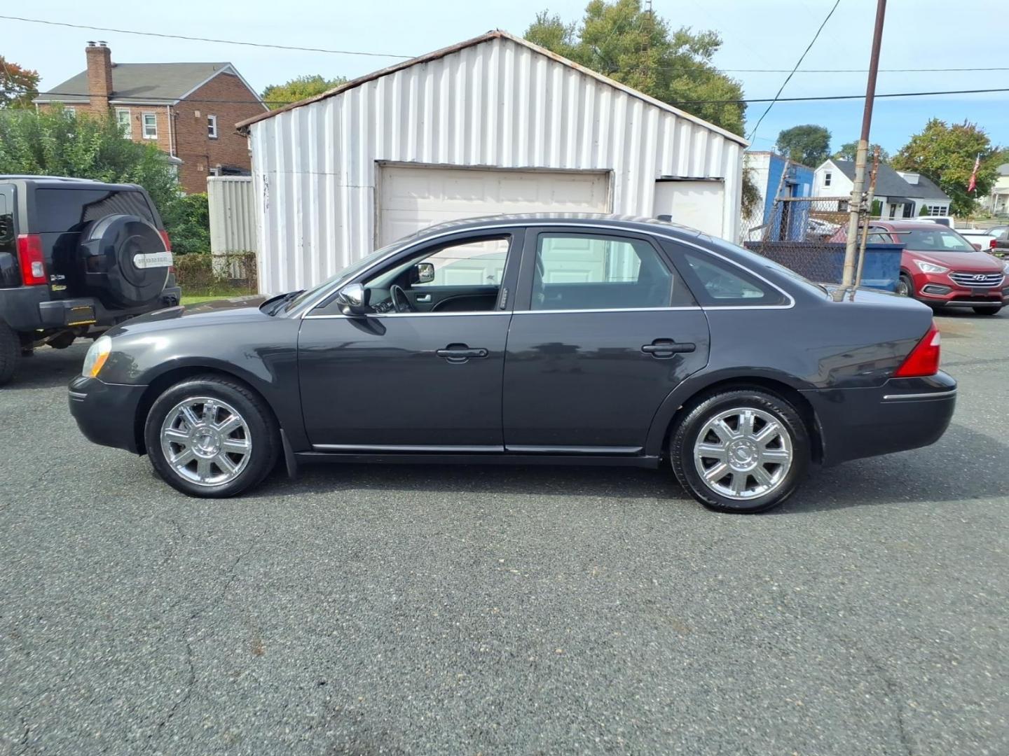 2007 Black Ford Five Hundred Limited (1FAHP28137G) with an 3.0L 6 Cylinder Fuel Injected engine, Automatic transmission, located at 50 Eastern Blvd., Essex, MD, 21221, (410) 686-3444, 39.304367, -76.484947- Photo#1