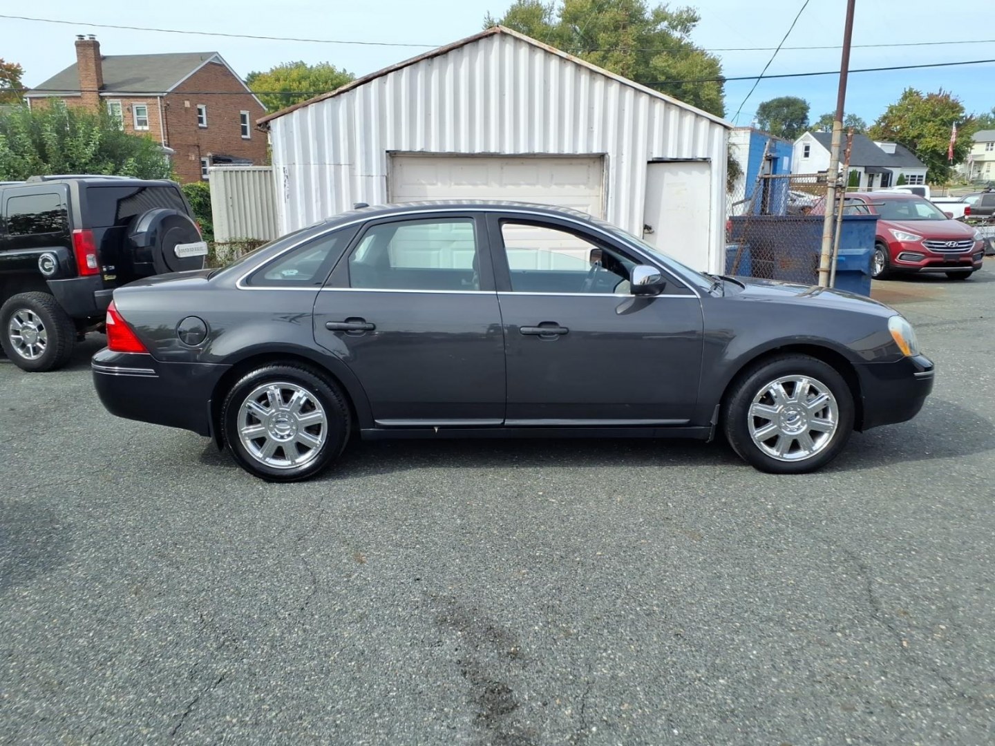 2007 Black Ford Five Hundred Limited (1FAHP28137G) with an 3.0L 6 Cylinder Fuel Injected engine, Automatic transmission, located at 50 Eastern Blvd., Essex, MD, 21221, (410) 686-3444, 39.304367, -76.484947- Photo#4