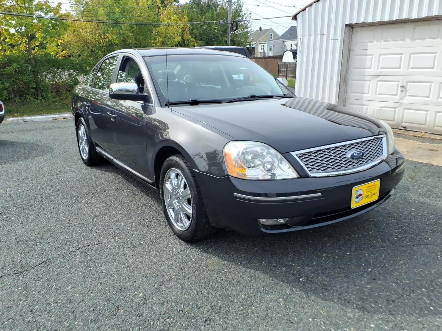 2007 Black Ford Five Hundred Limited (1FAHP28137G) with an 3.0L 6 Cylinder Fuel Injected engine, Automatic transmission, located at 50 Eastern Blvd., Essex, MD, 21221, (410) 686-3444, 39.304367, -76.484947- Photo#5