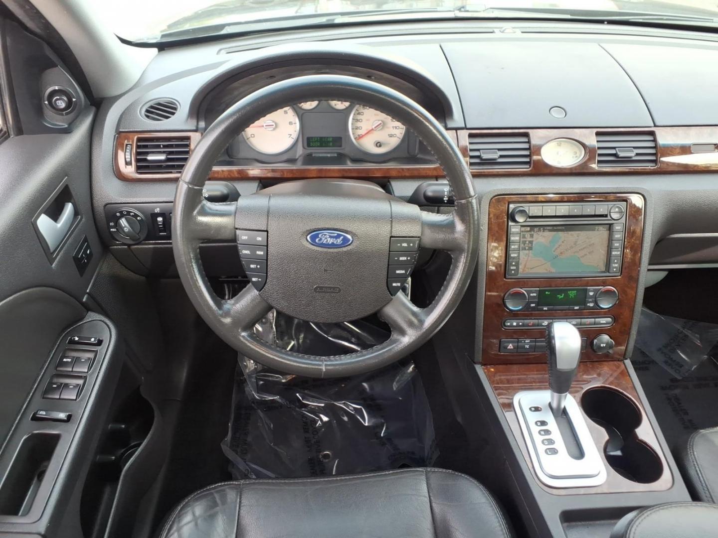 2007 Black Ford Five Hundred Limited (1FAHP28137G) with an 3.0L 6 Cylinder Fuel Injected engine, Automatic transmission, located at 50 Eastern Blvd., Essex, MD, 21221, (410) 686-3444, 39.304367, -76.484947- Photo#17