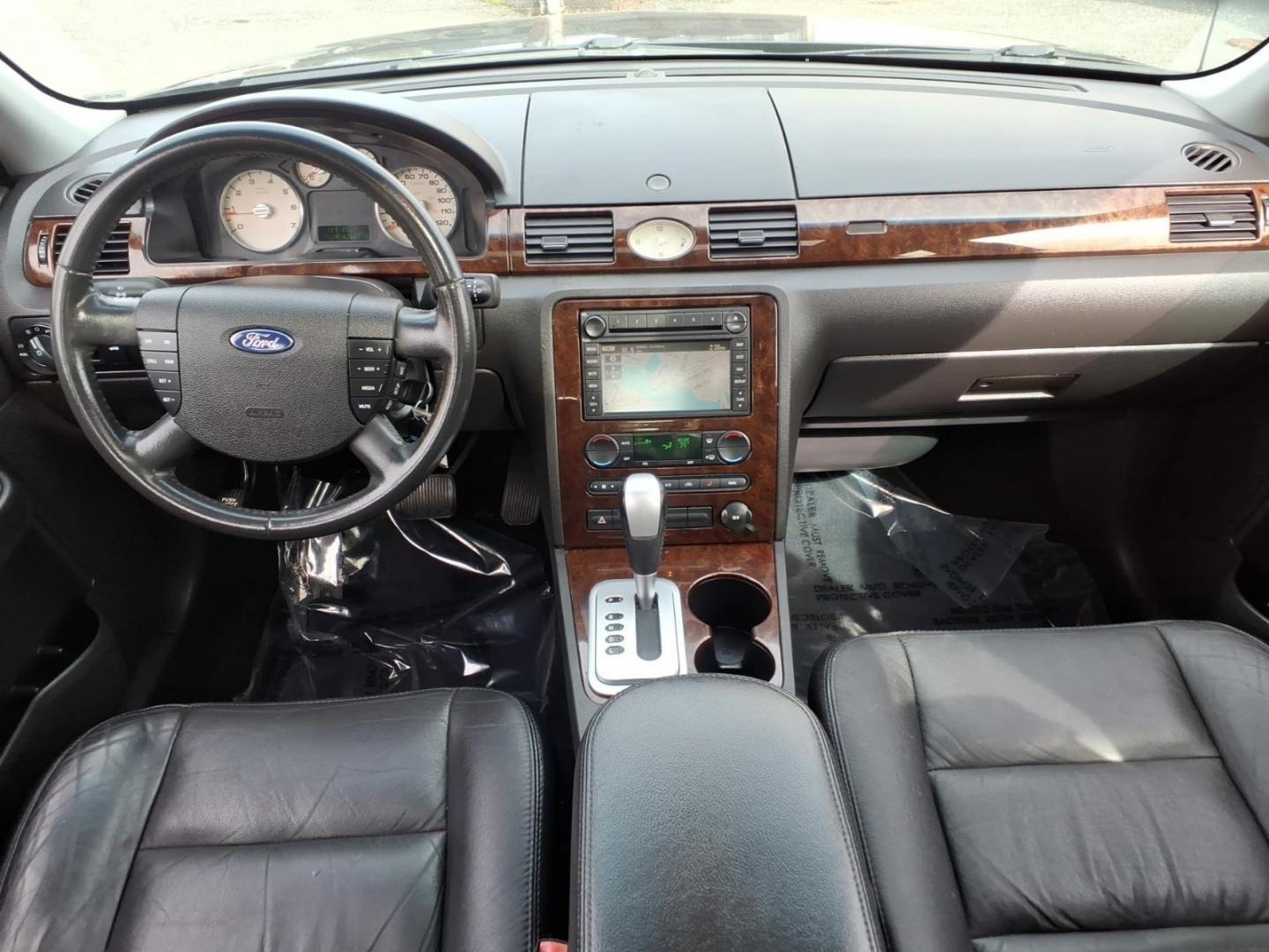 2007 Black Ford Five Hundred Limited (1FAHP28137G) with an 3.0L 6 Cylinder Fuel Injected engine, Automatic transmission, located at 50 Eastern Blvd., Essex, MD, 21221, (410) 686-3444, 39.304367, -76.484947- Photo#18