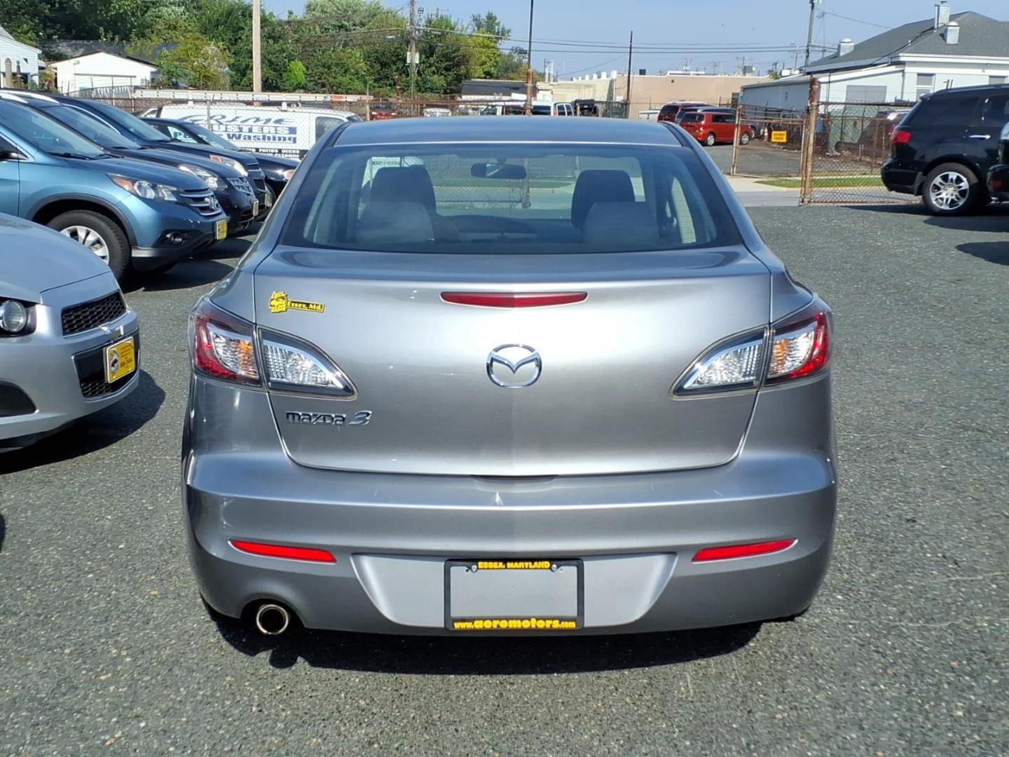 2012 Grey Mazda Mazda3 i Touring (JM1BL1VG3C1) with an 2.0L 4 Cylinder Sequential-Port F.I. engine, Automatic transmission, located at 50 Eastern Blvd., Essex, MD, 21221, (410) 686-3444, 39.304367, -76.484947- Photo#3
