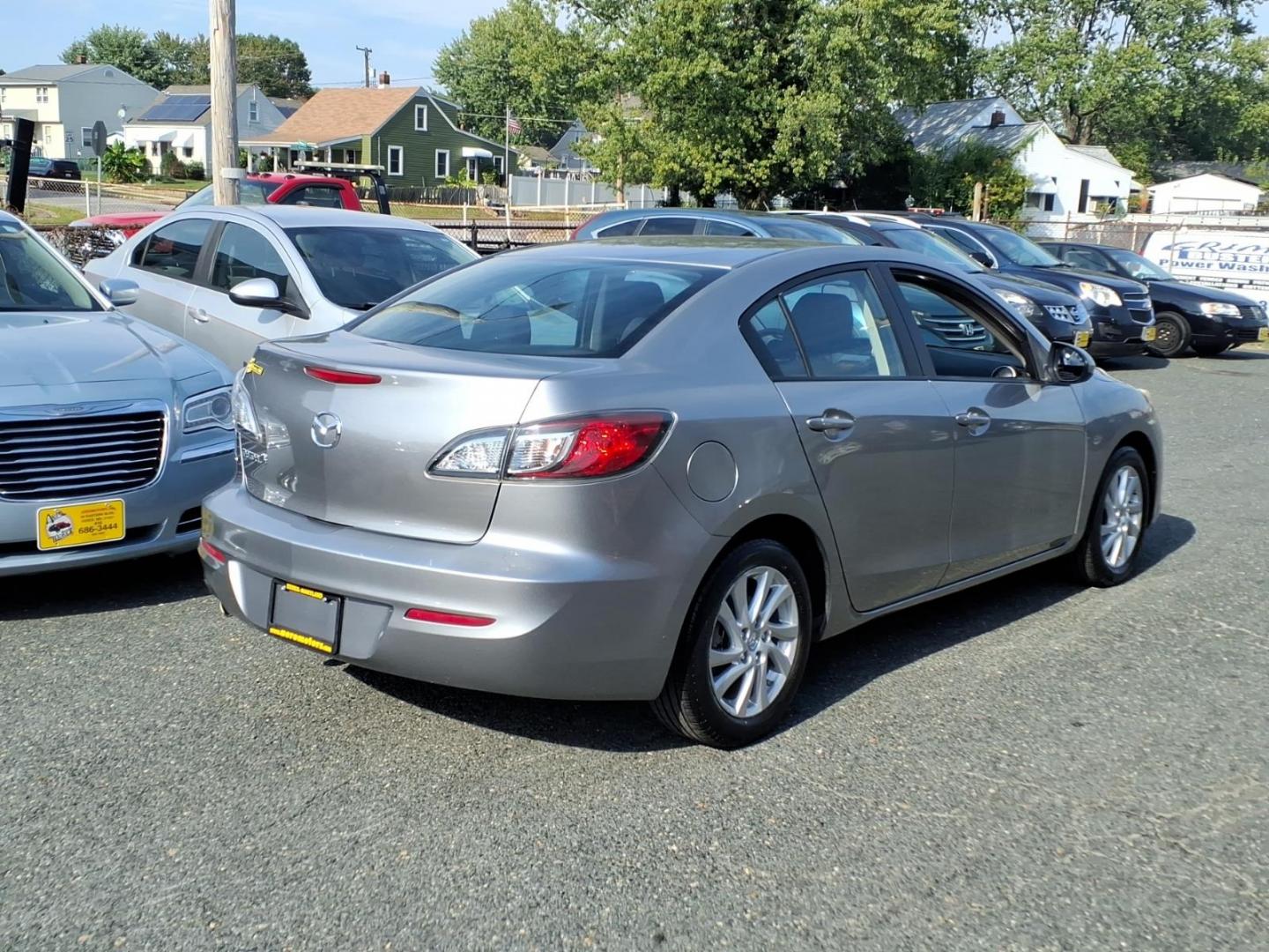 2012 Grey Mazda Mazda3 i Touring (JM1BL1VG3C1) with an 2.0L 4 Cylinder Sequential-Port F.I. engine, Automatic transmission, located at 50 Eastern Blvd., Essex, MD, 21221, (410) 686-3444, 39.304367, -76.484947- Photo#4