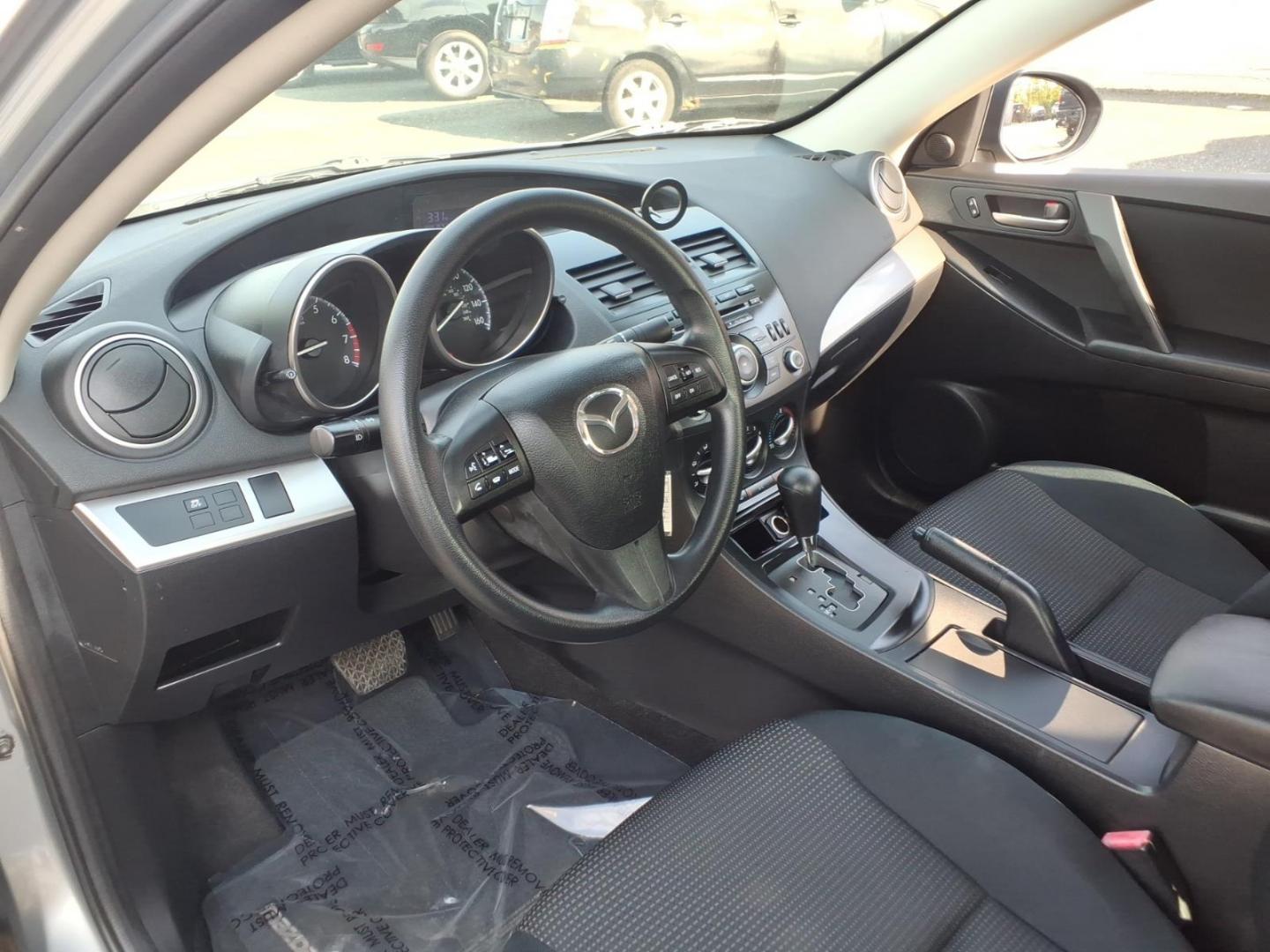 2012 Grey Mazda Mazda3 i Touring (JM1BL1VG3C1) with an 2.0L 4 Cylinder Sequential-Port F.I. engine, Automatic transmission, located at 50 Eastern Blvd., Essex, MD, 21221, (410) 686-3444, 39.304367, -76.484947- Photo#8